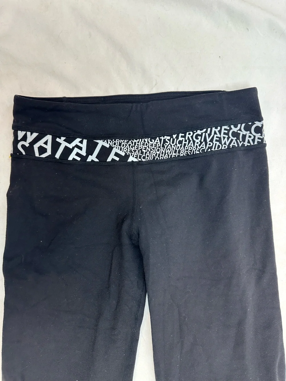 lululemon Black Capri Leggings with White Logo Waistband 6